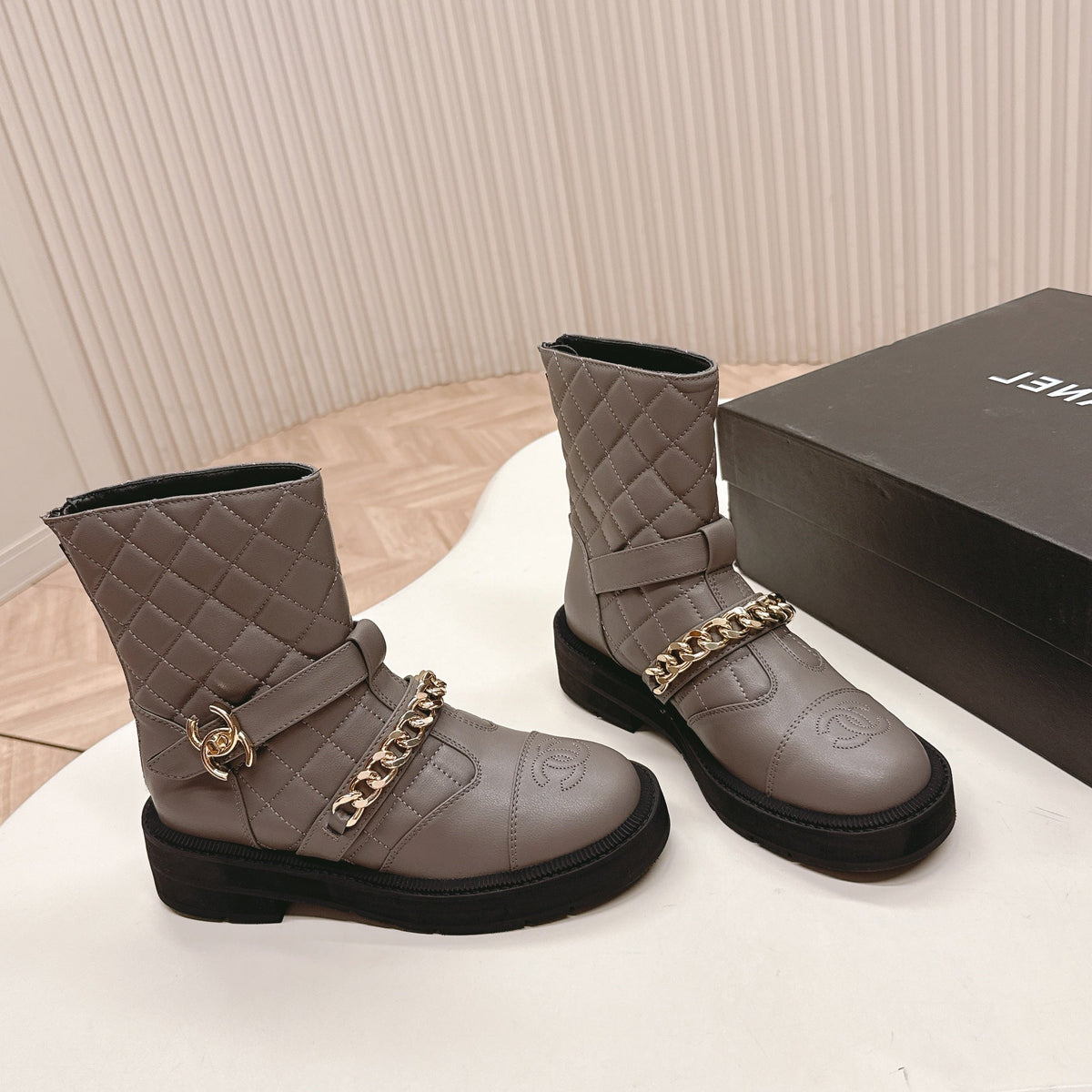 CHANEL ANKLE BOOTS 25S IN SMOKY GREY LAMBSKIN EMBOSSED LOGO WITH GOLD HARDWARE