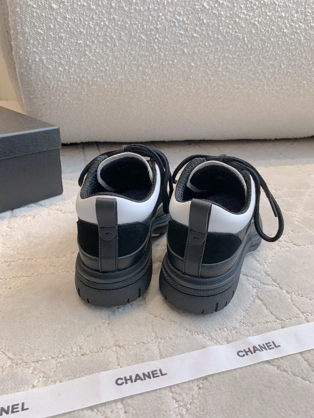 CHANEL 25S TRAINERS 40MM IN BLACK AND WHITE CALFSKIN AND SUEDE
